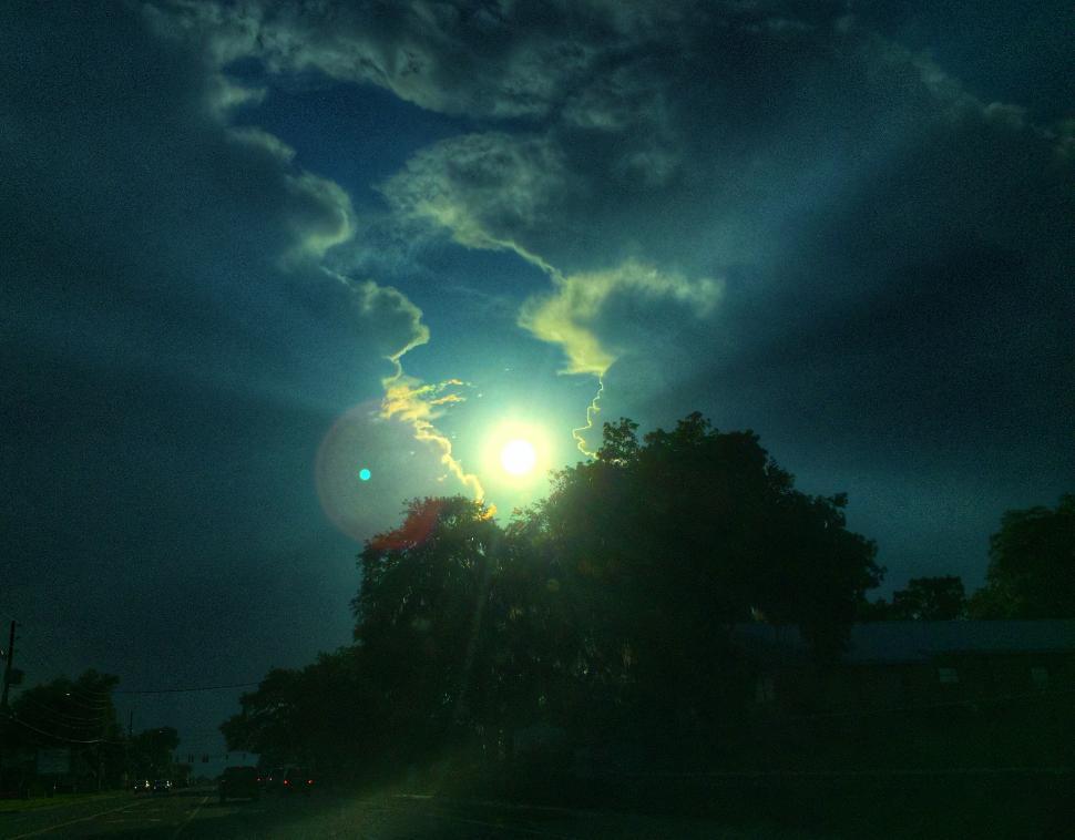 Free Image of Sun Parting Storm Clouds  