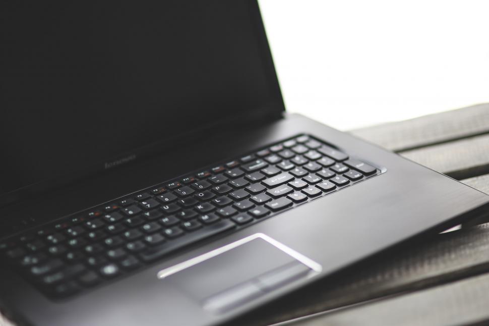 Free Image of Laptop Computer on Wooden Table 