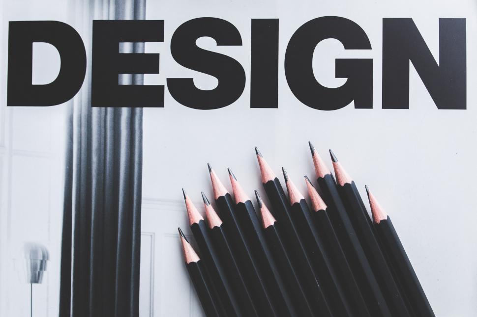 Free Image of Pencils on Top of a Book 