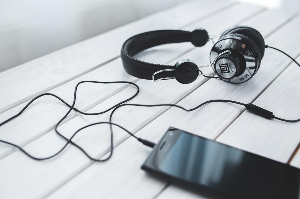 Free Image of Headphones Resting on Table 