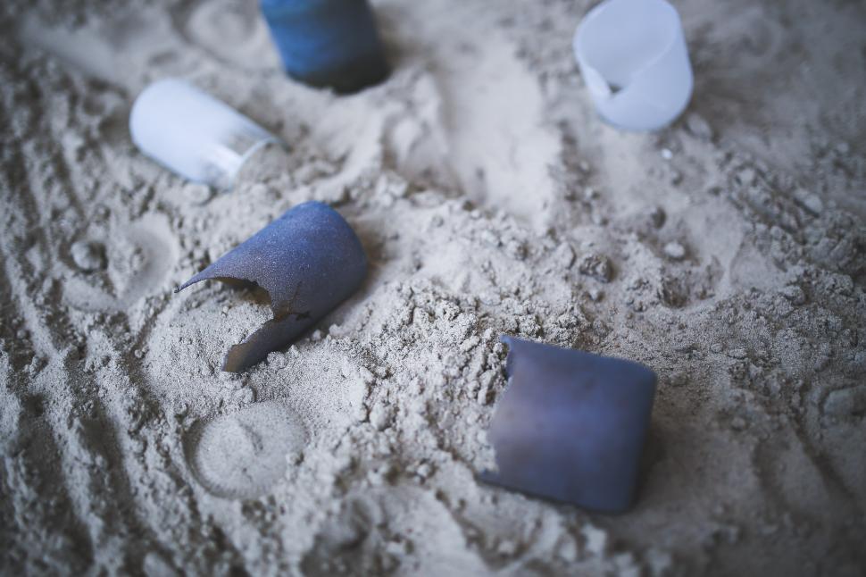 Free Image of Close Up of Sand Covered Ground 