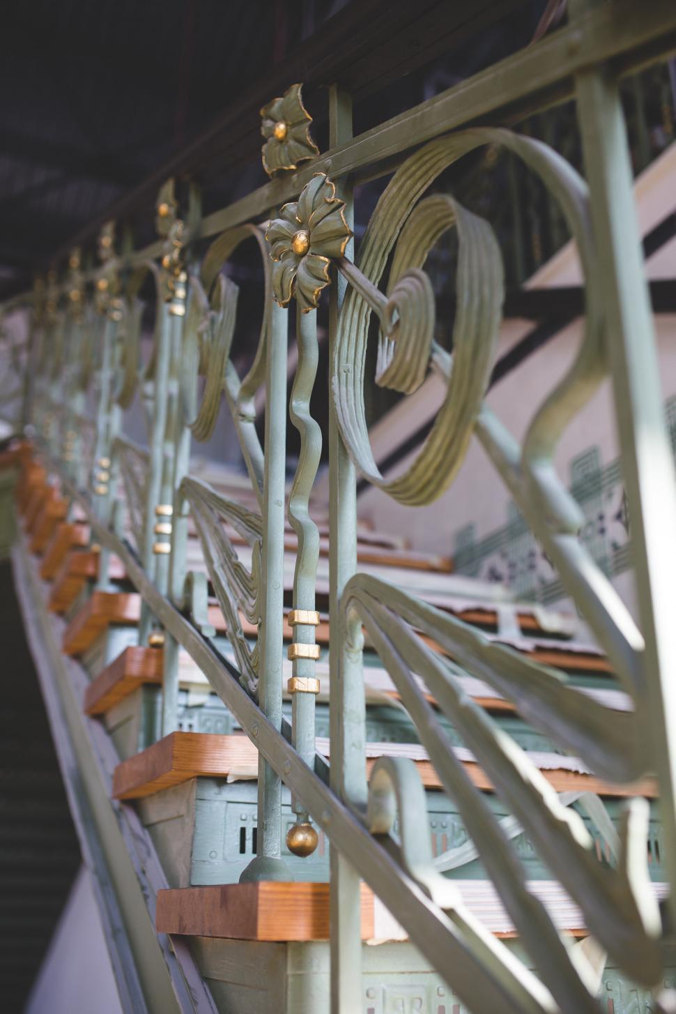 Free Image of Metal Railing With Clock 