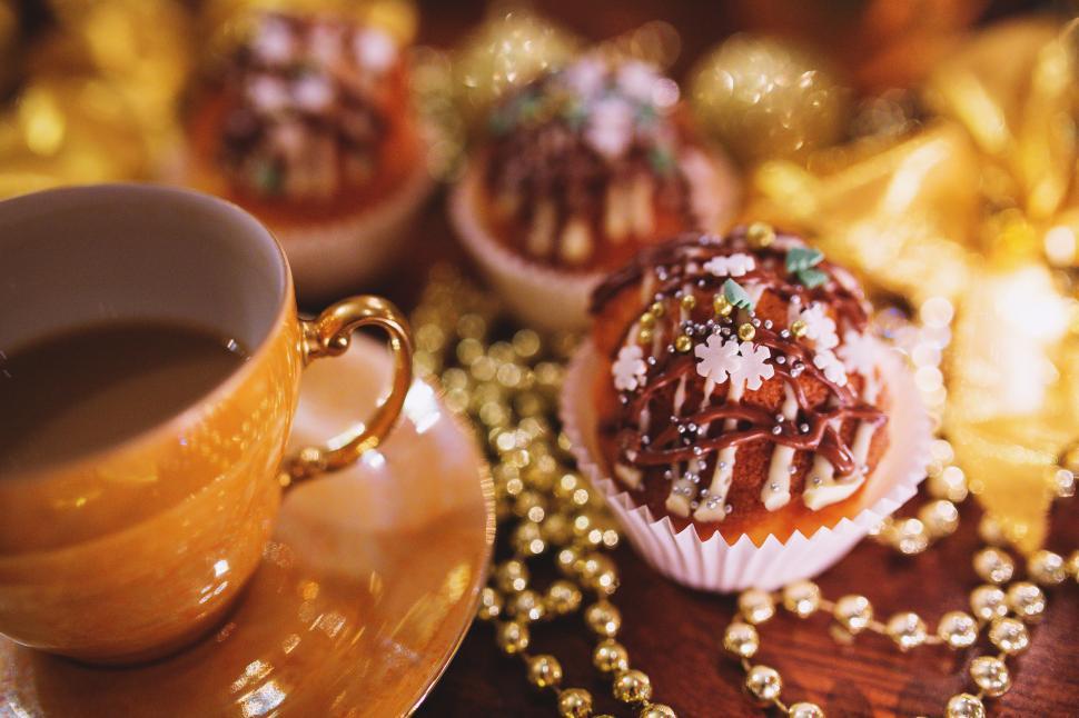 Free Image of A Close Up of a Cup of Coffee and Plate of Pastries 