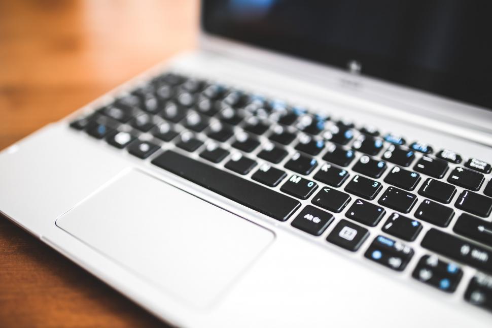 Free Image of Laptop Computer on Wooden Table 