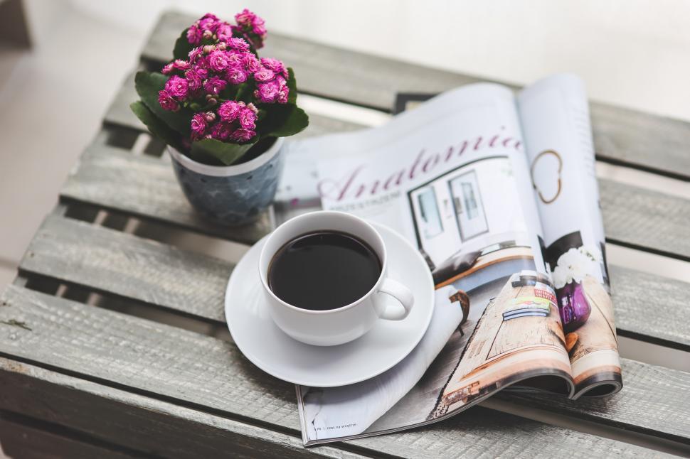Free Image of A Cup of Coffee on a Wooden Table 