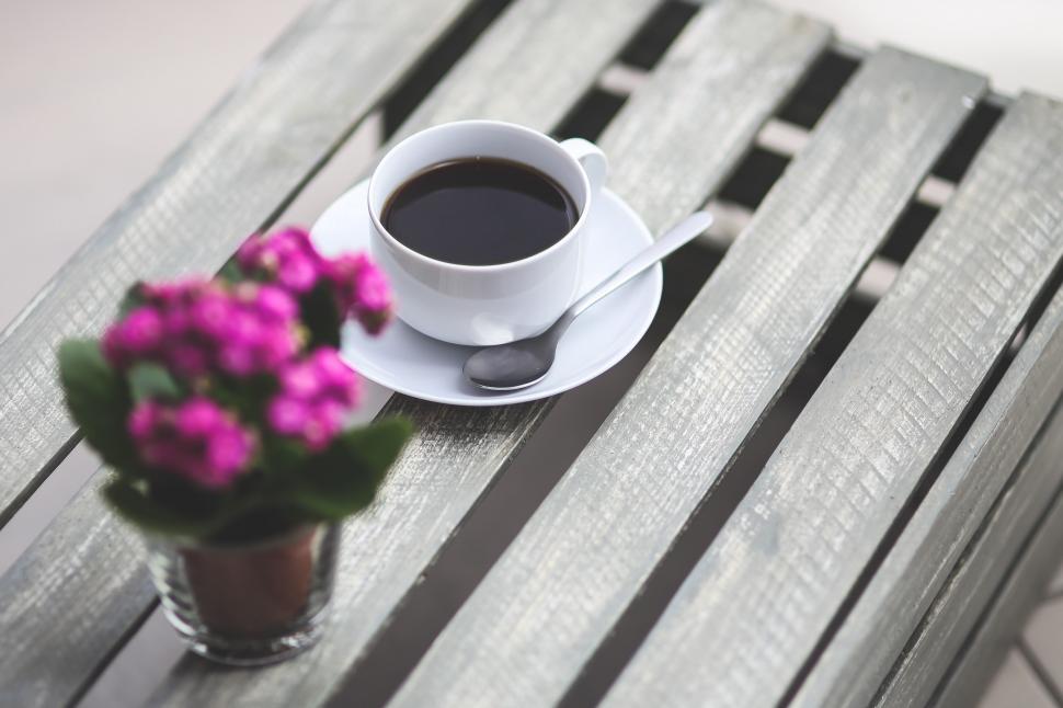 Free Image of A Cup of Coffee on a Wooden Table 