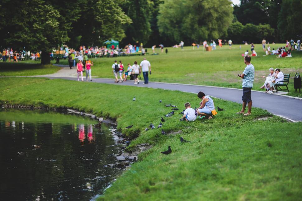 Free Image of People Enjoying a Riverside Gathering 