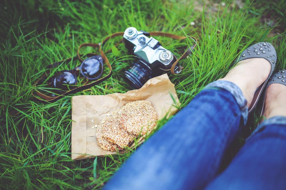 Free Image of Jeans and Shoes on Grass Field 