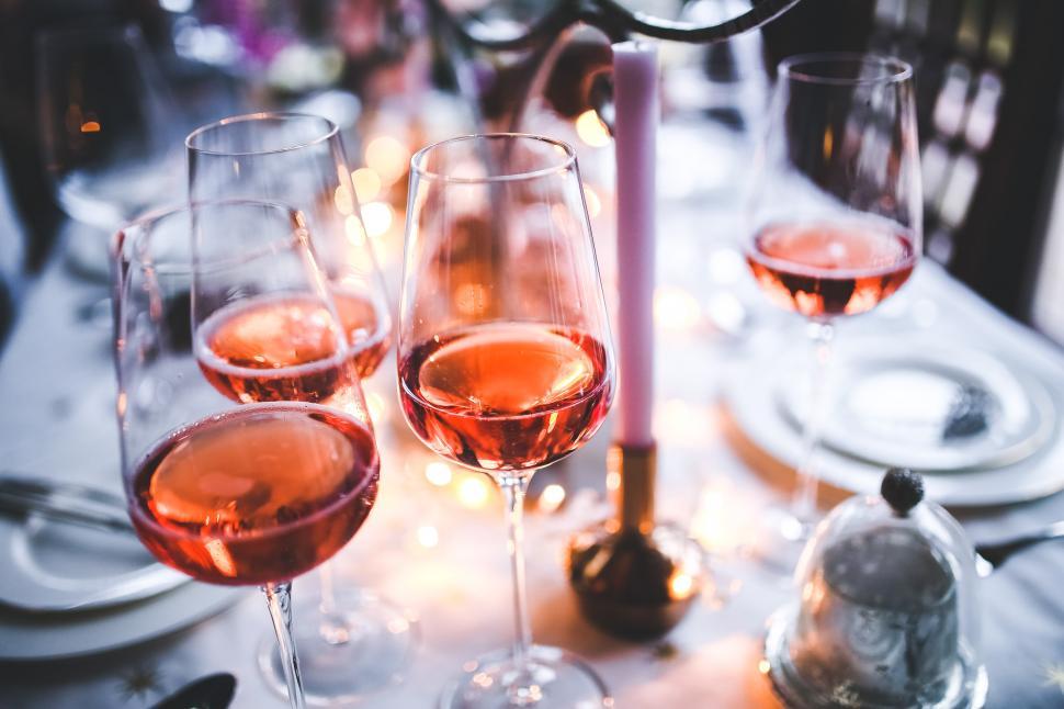 Free Image of Table Set With Glasses of Wine and Plates 