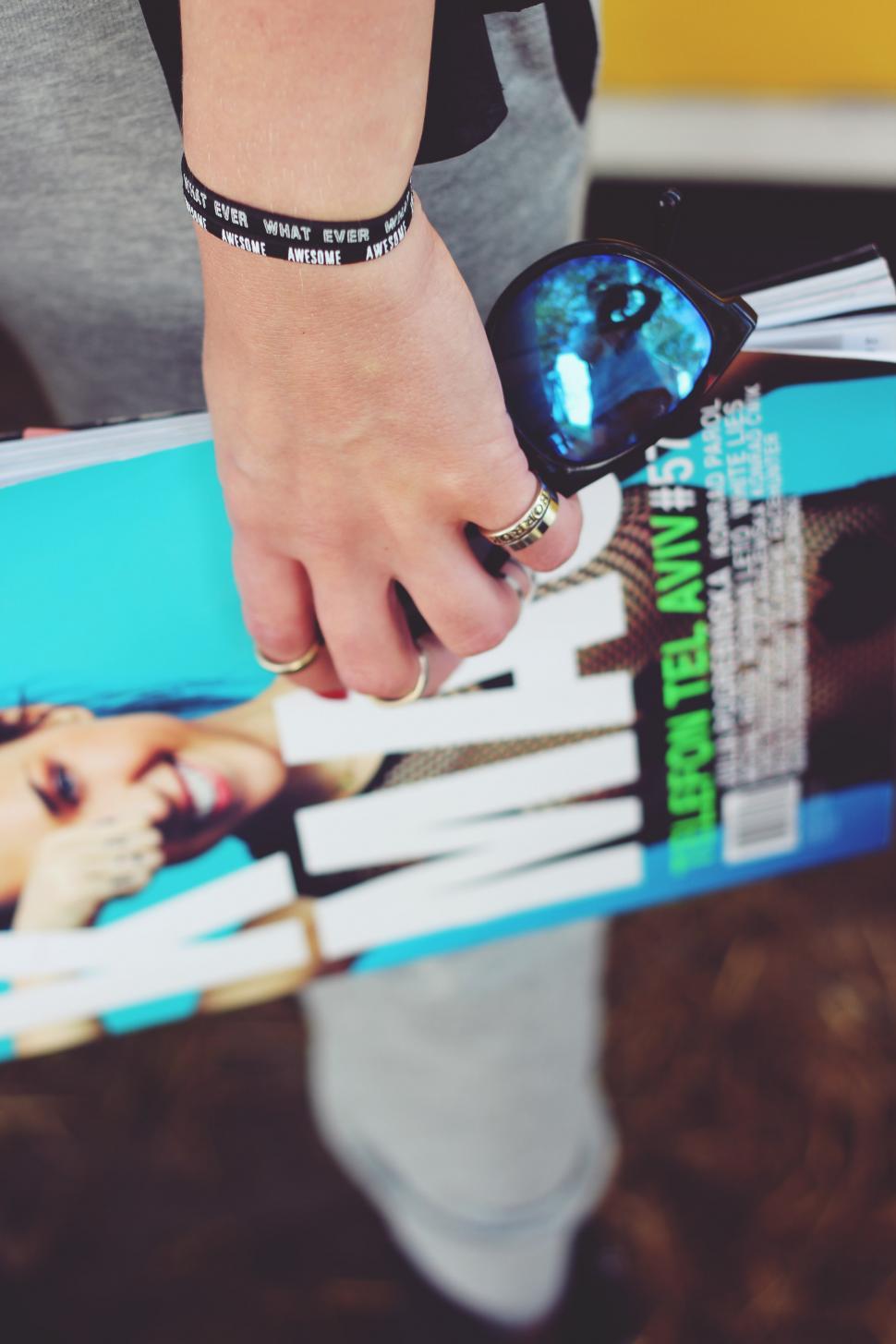 Free Image of Person Holding Skateboard With Watch 