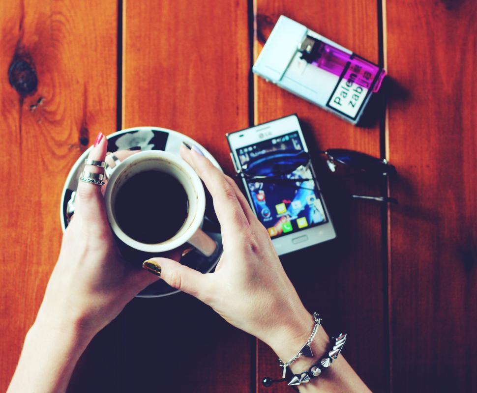 Free Image of Person Holding a Cup of Coffee 