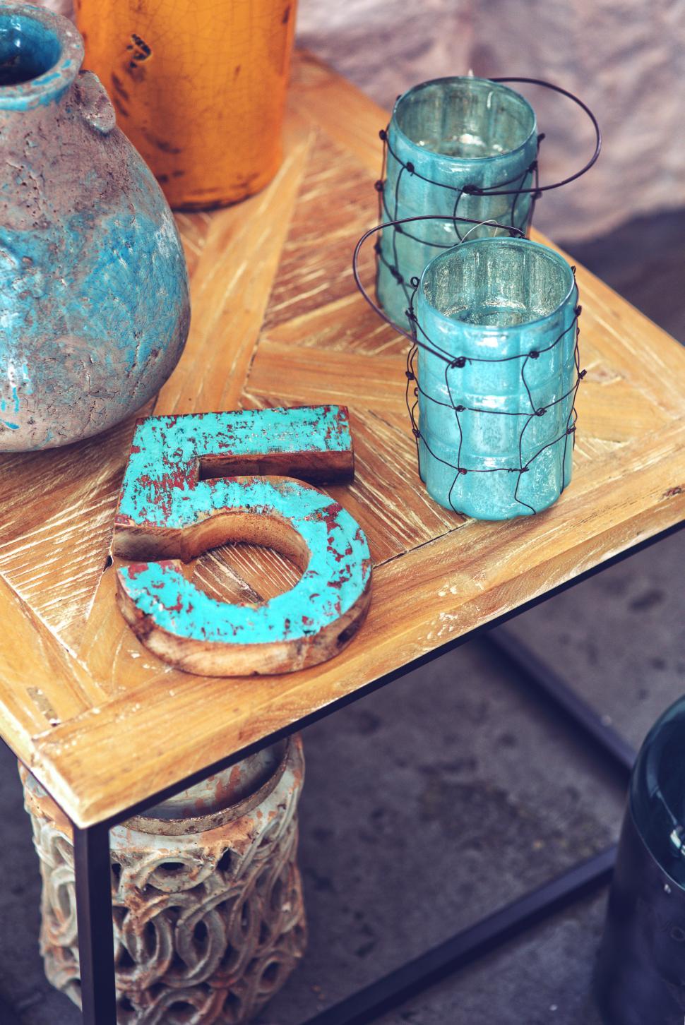 Free Image of Wooden Table With Vases and Jars 