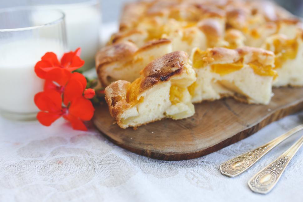 Free Image of Piece of Pie on Wooden Cutting Board 