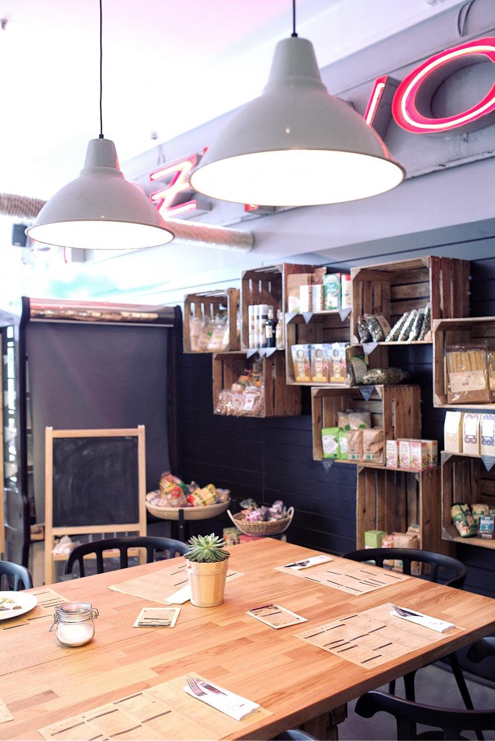 Free Image of Wooden Table Under Hanging Lights 