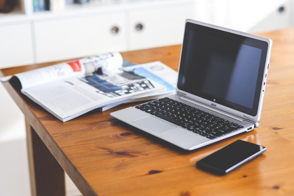 Free Image of Laptop Computer on Wooden Table 