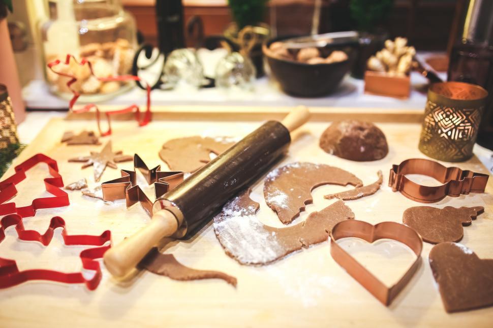 Free Image of Table With Cookie Cutters and Cookies 