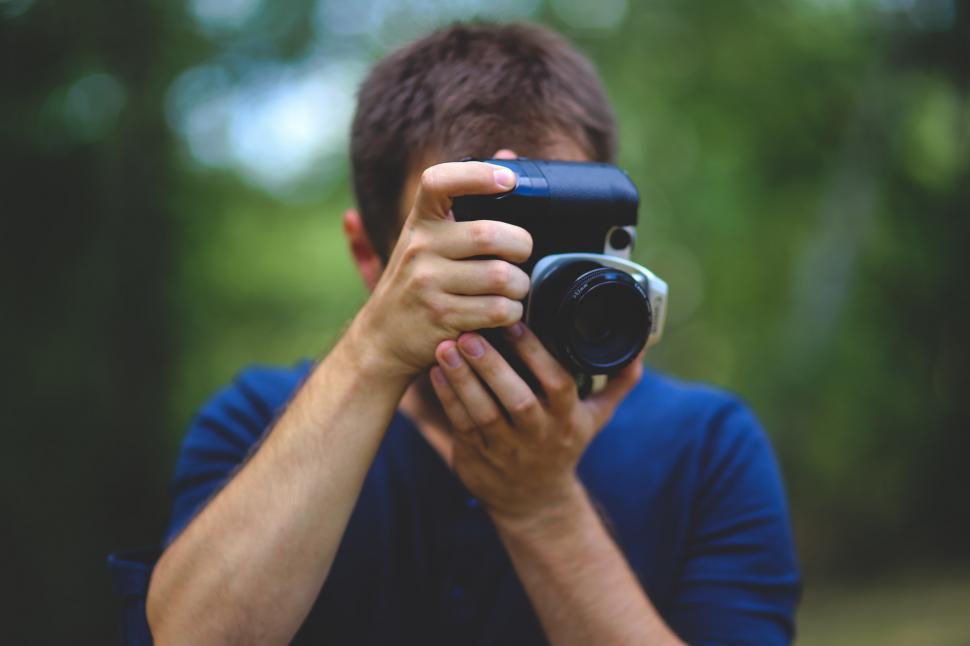 Free Image of Man Taking a Selfie With Camera 