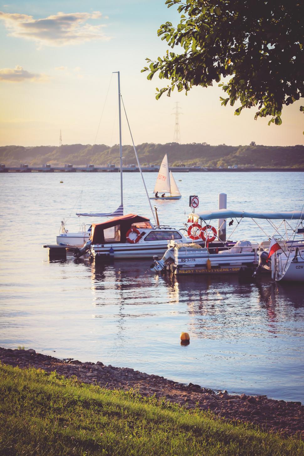 Free Image of Two Boats Floating in Water 