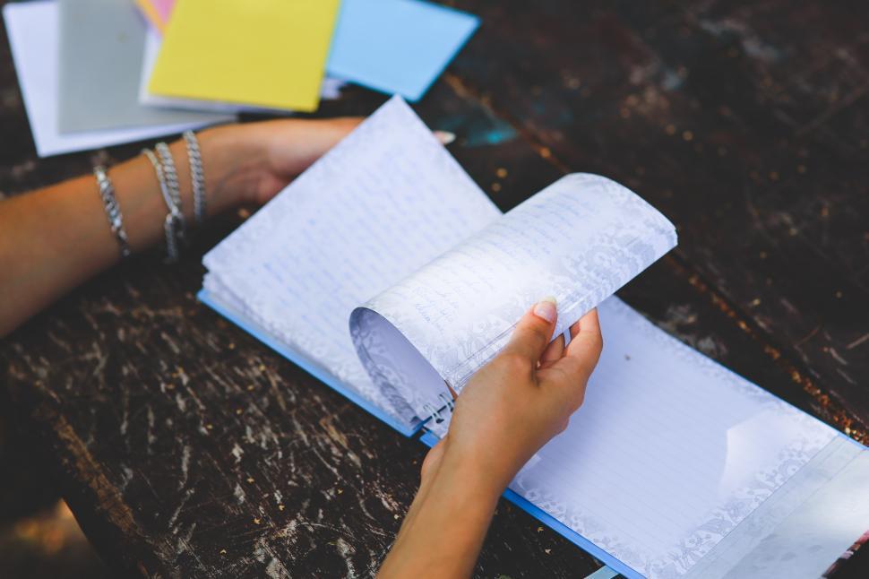 Free Image of Person Holding Piece of Paper 