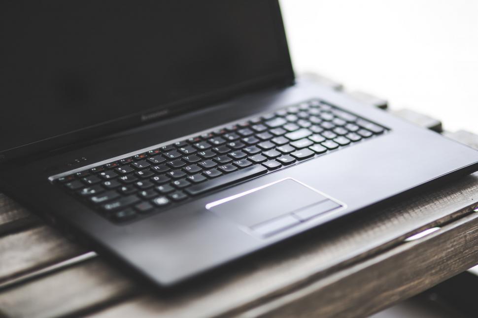 Free Image of Laptop Computer on Wooden Table 