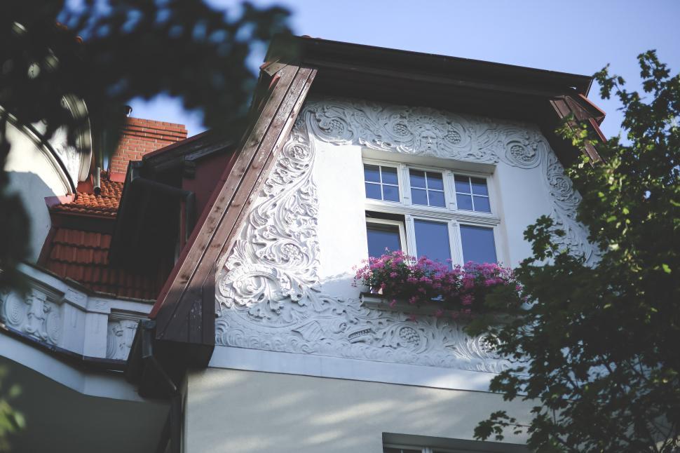 Free Image of White House With Red Roof and Windows 