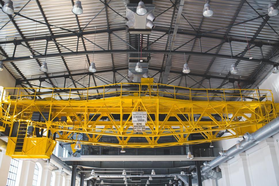 Free Image of Large Yellow Crane Inside Building 