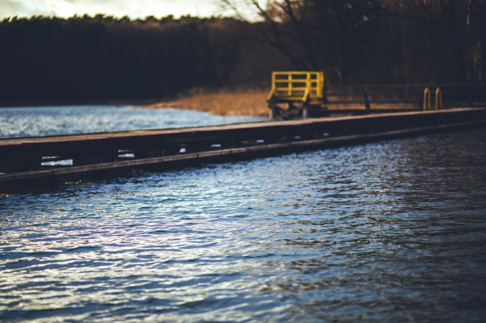 Free Image of Truck Parked Beside Water 