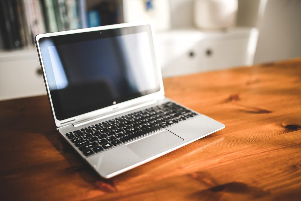 Free Image of Laptop Computer on Wooden Table 