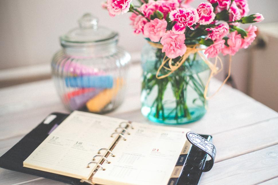 Free Image of Pink Flowers Vase and Notebook 