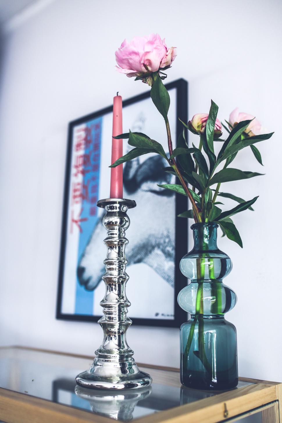 Free Image of Two Vases With Flowers on a Table 
