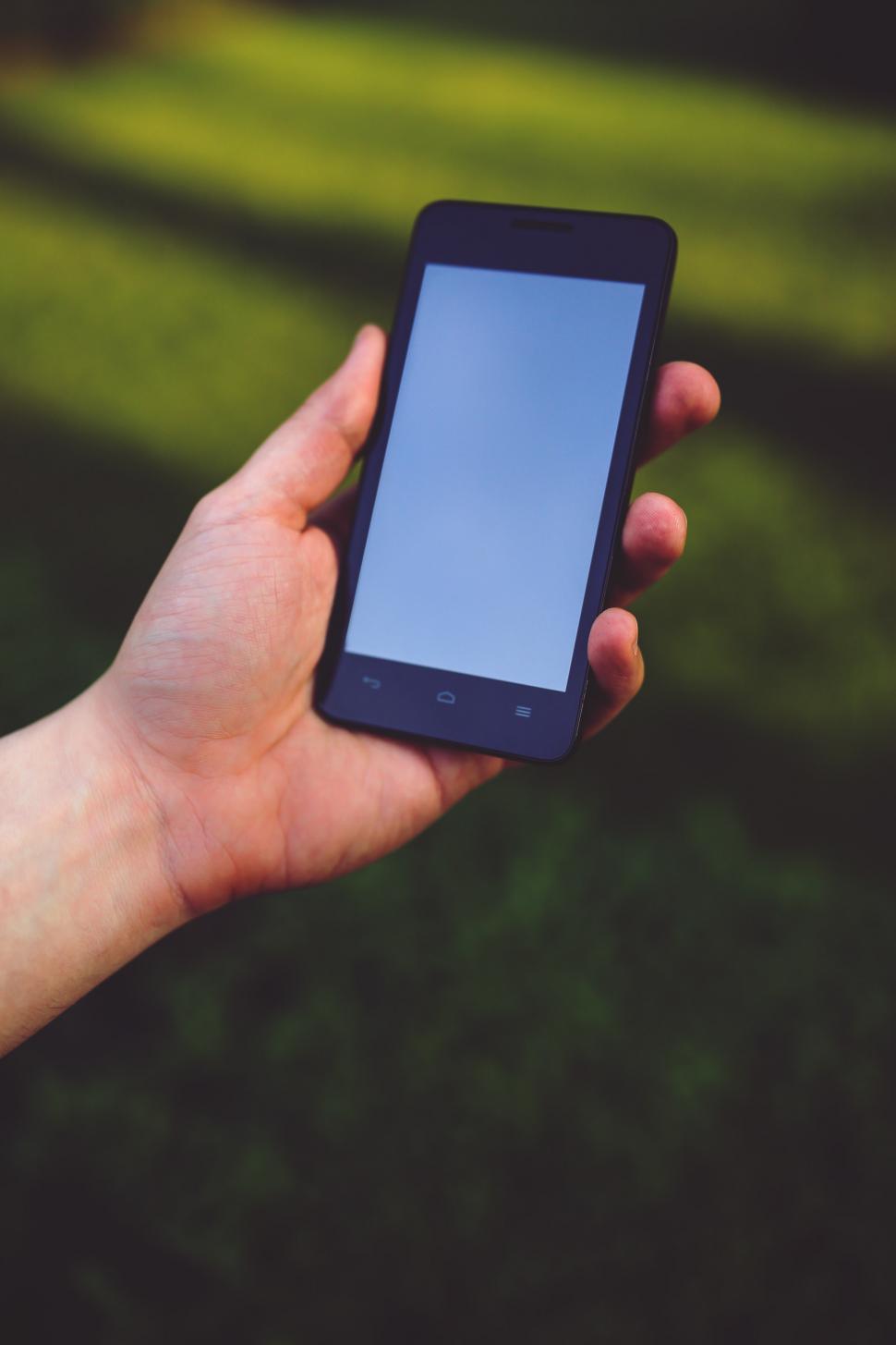 Free Image of Person Holding Smart Phone 