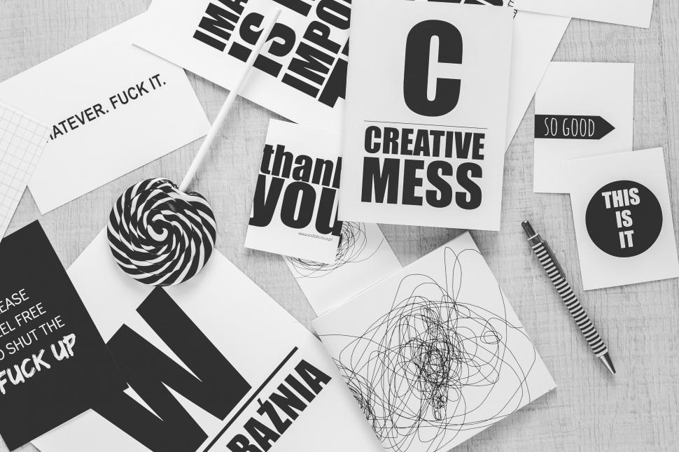 Free Image of Assorted Stickers Piled on Table 