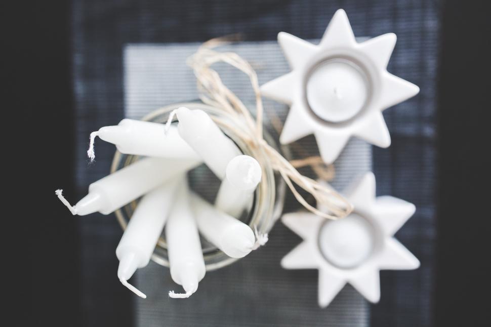 Free Image of Two White Candles on Table 