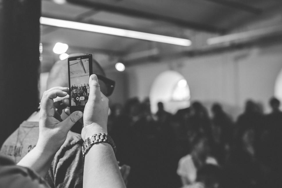 Free Image of Person Taking a Picture in Black and White 