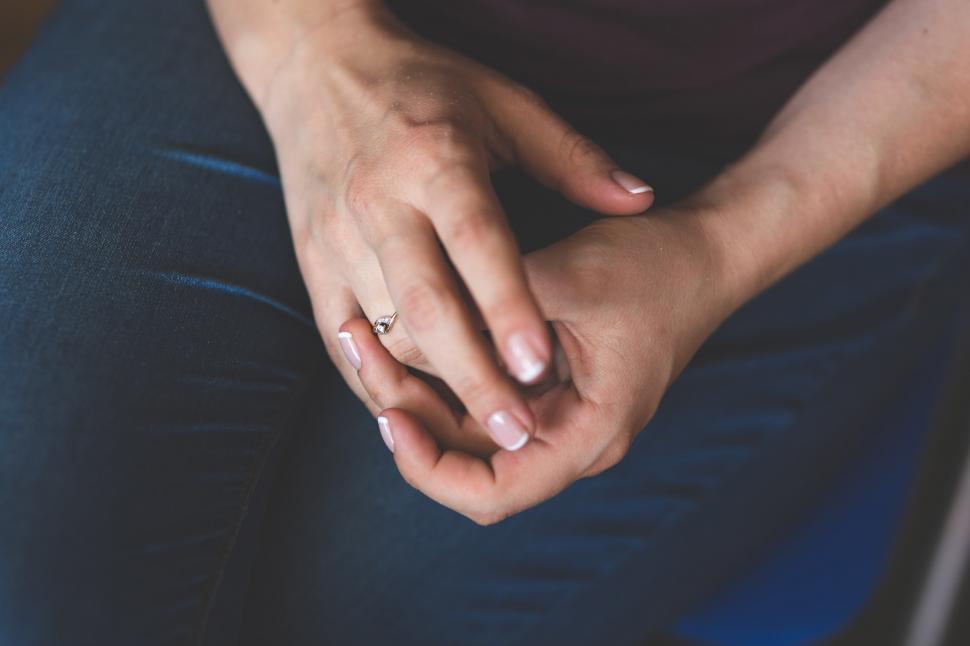 Free Image of Person Holding Hands Together 