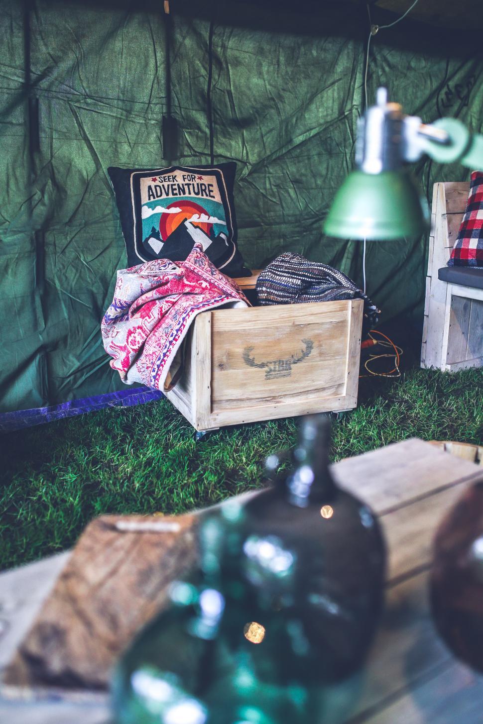 Free Image of Table With Lamp and Bottles 