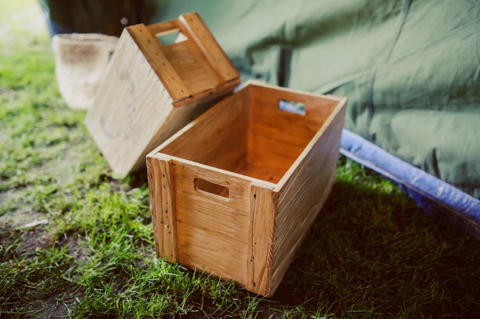 Free Image of Wooden Box on Lush Green Field 