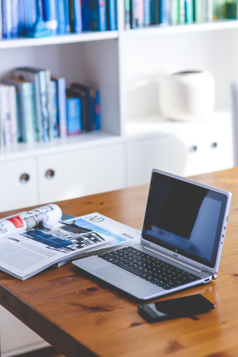Free Image of Laptop Computer on Wooden Table 