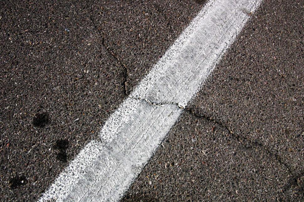 Free Image of Cracked blacktop 