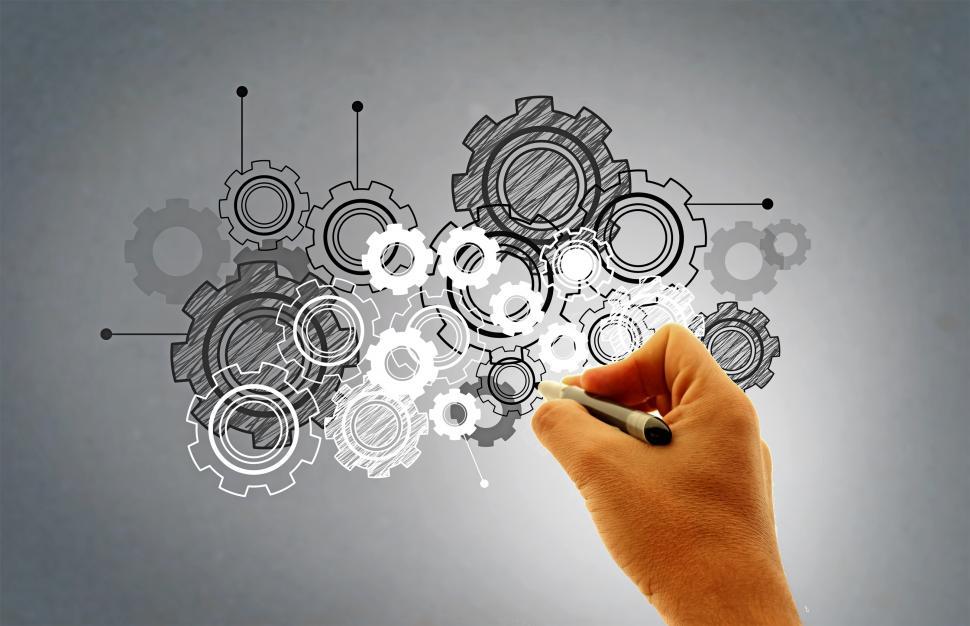 Free Image of Hand Drawing Virtual Cogwheels - Work and Engineering Concept 
