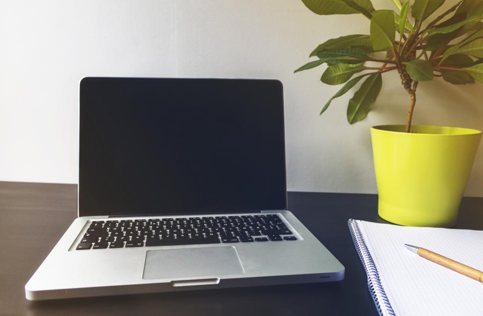 Free Image of Laptop and notebook on desk  