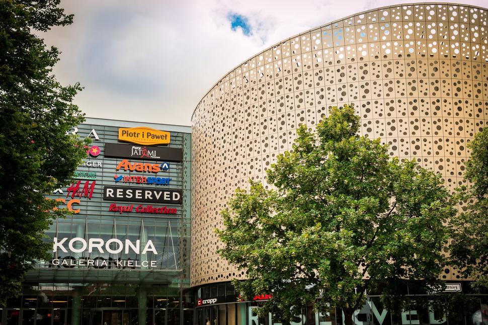 Free Image of Building Covered in Numerous Signs 