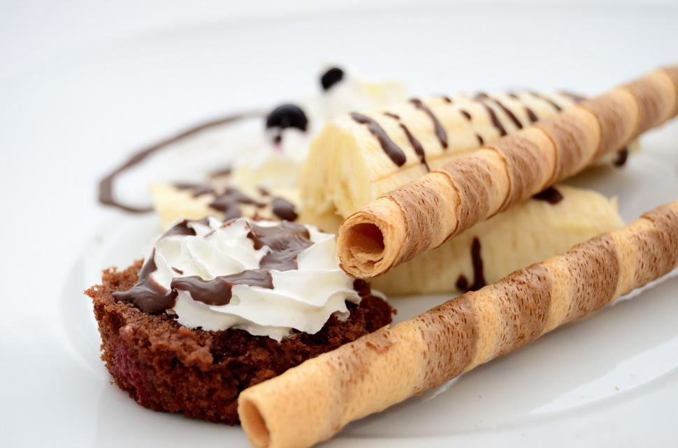 Free Image of White Plate With Dessert Items on Table 