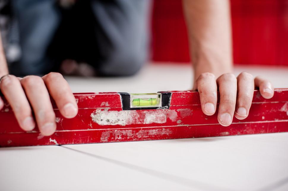 Free Image of Person Holding Tape Measure 
