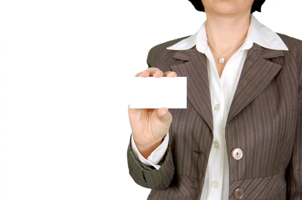 Free Image of Woman in Business Suit Holding Business Card 