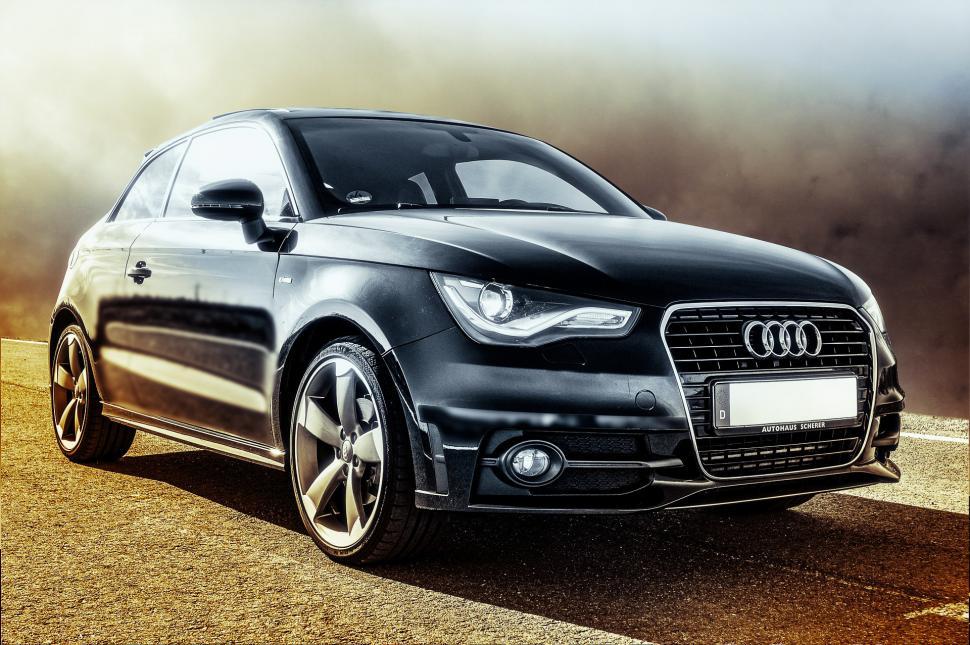 Free Image of Black Car Parked on Side of Road 