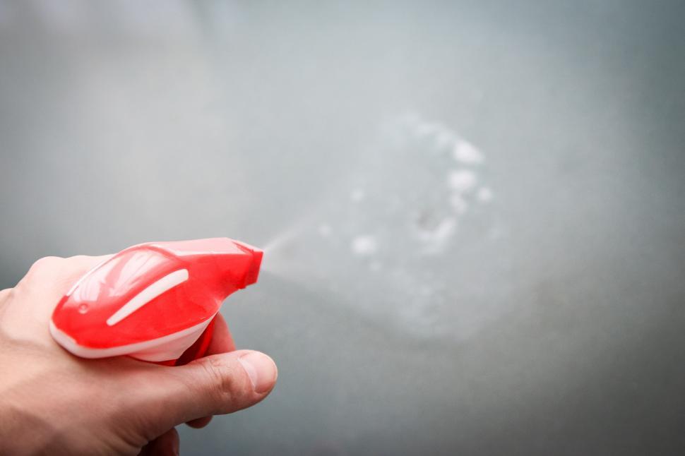 Free Image of Person Holding Red Object 