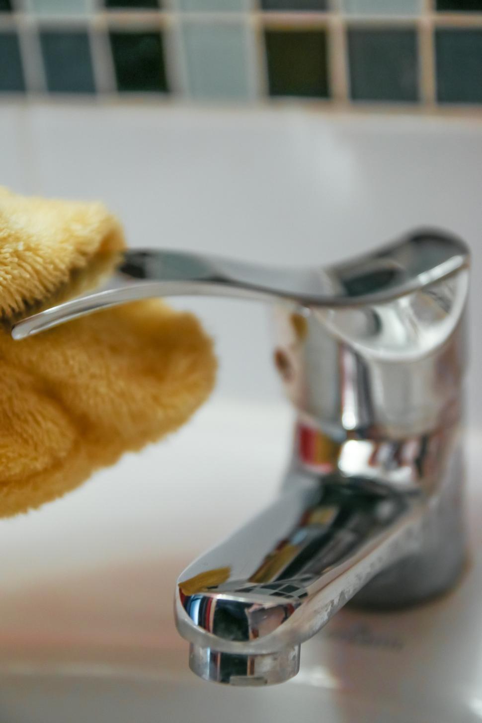 Free Image of Person Cleaning a Sink 