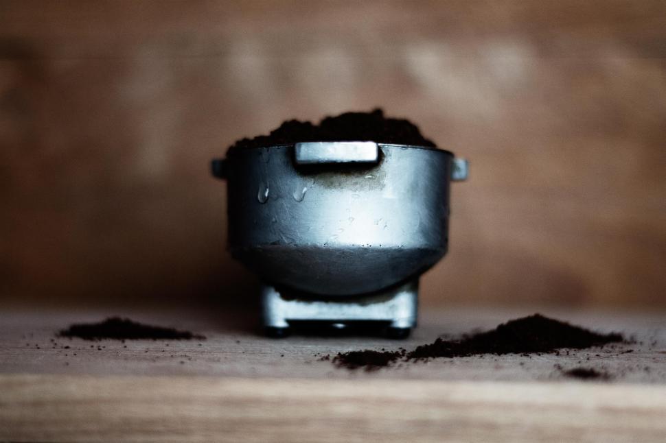 Free Image of Pot of Dirt on Wooden Table 
