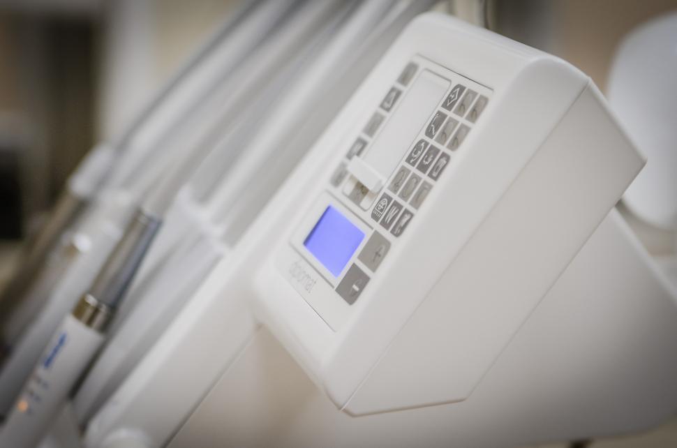 Free Image of Close Up of Machine With Blue Button 